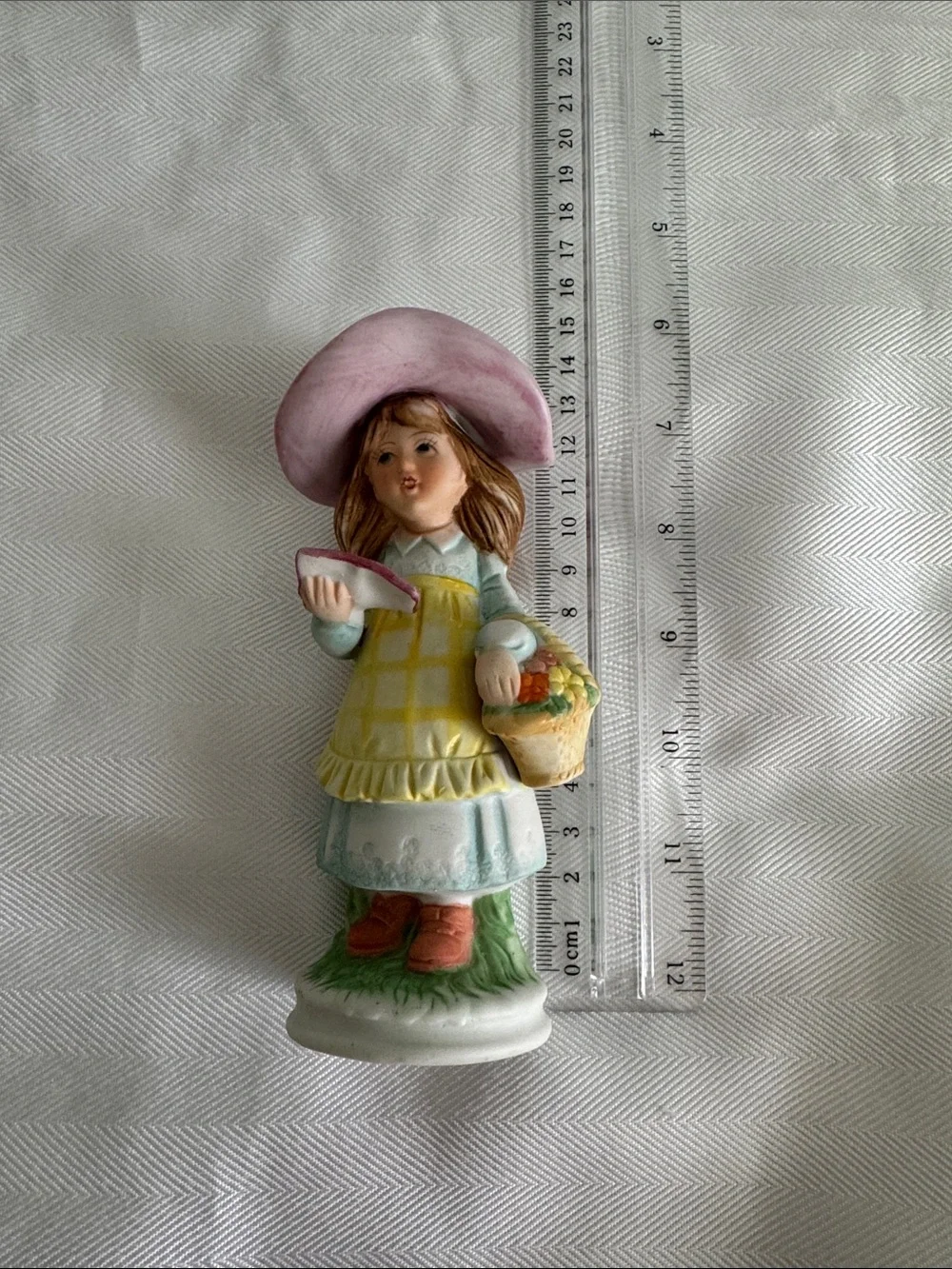 Hand-Painted Girl Figurine in Pink Hat and Yellow Apron - Unbranded